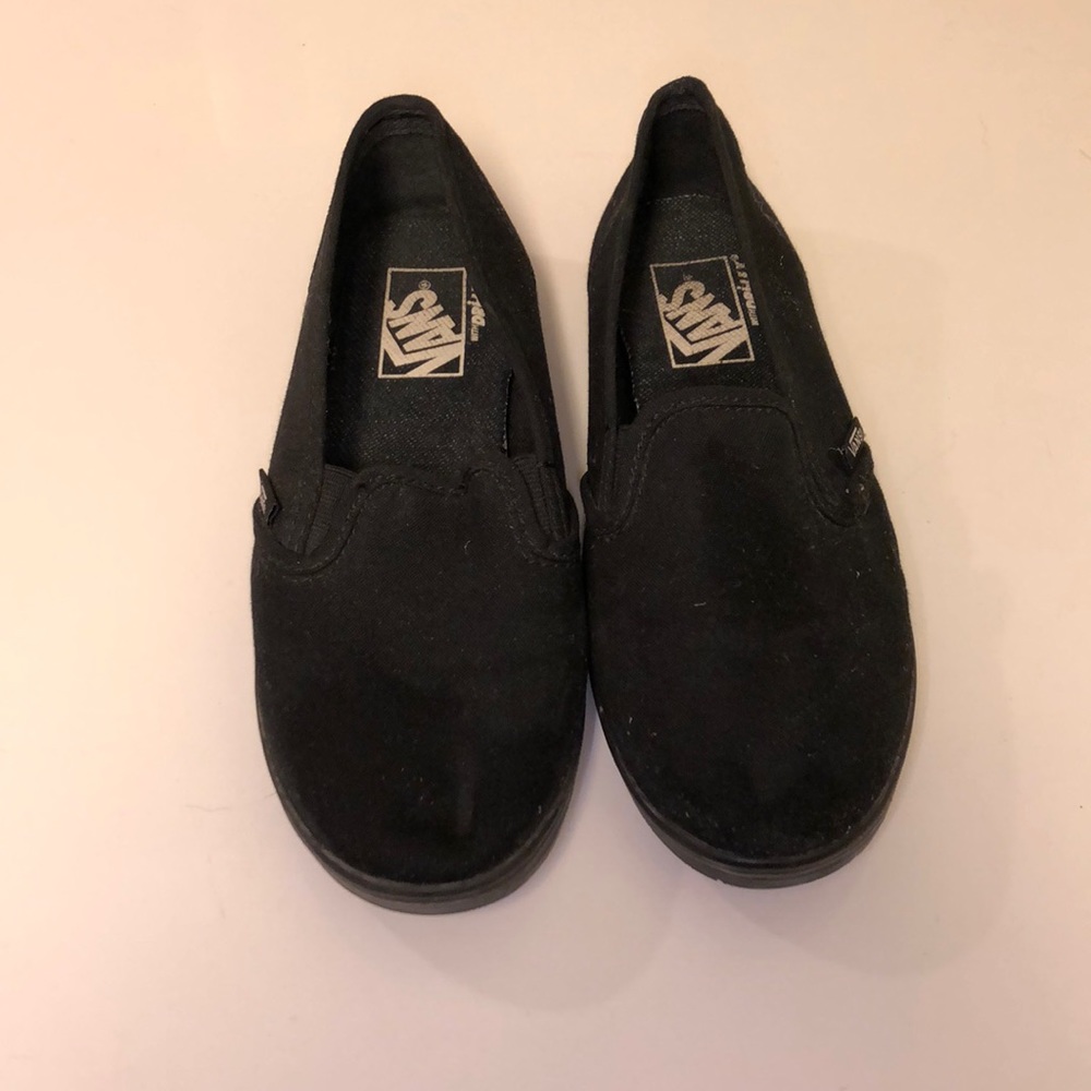 Black low rise slip on vans